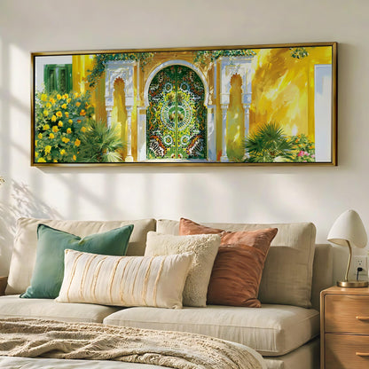 a large, colorful painting of a building with a green and yellow archway, hanging on a wall above a beige sofa with decorative pillows.