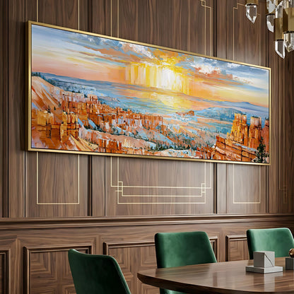a large, colorful painting of a desert landscape hanging on a wooden wall above a wooden dining table with green chairs.