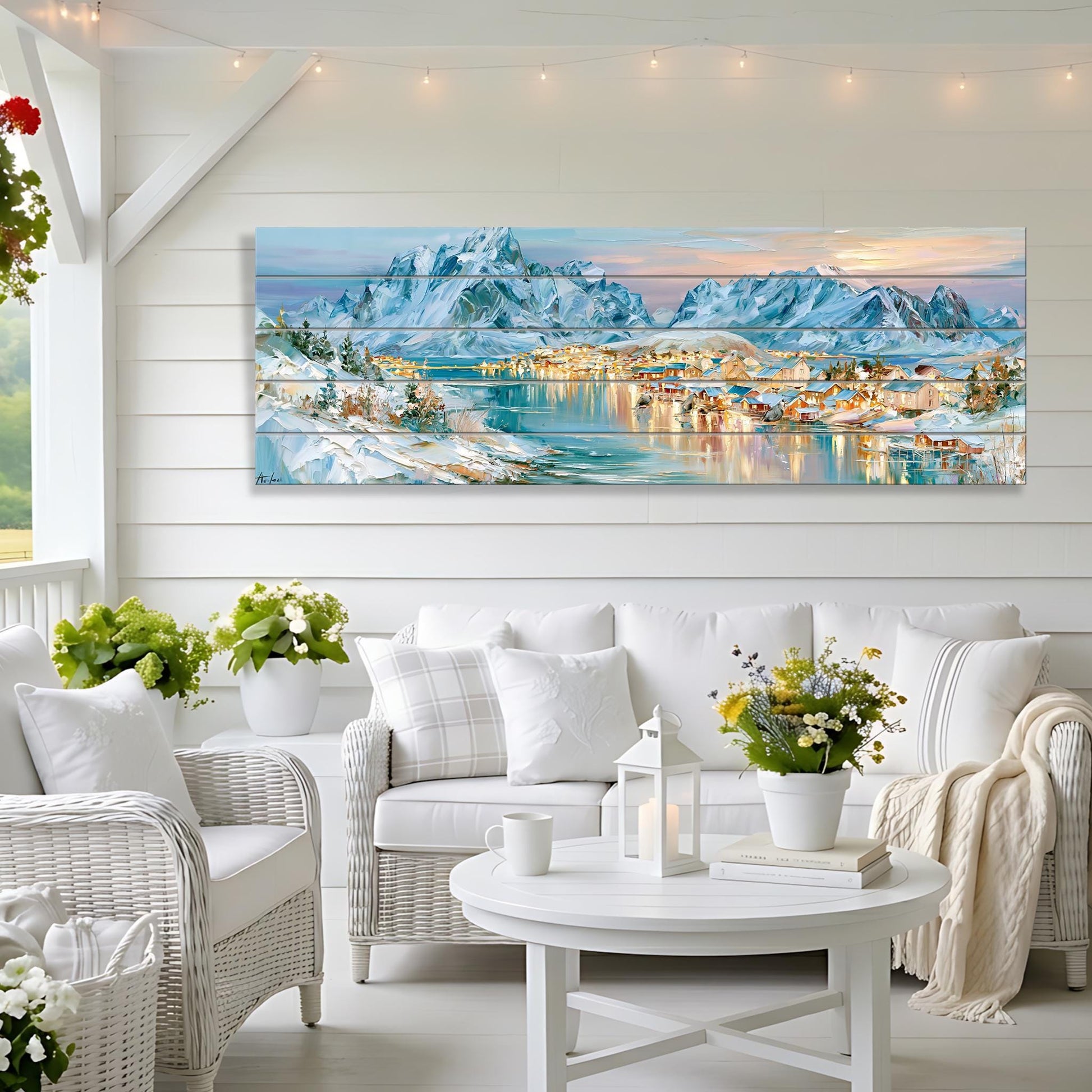 a cozy living room with a large, colorful painting of a snowy mountain landscape hanging on the wall. The room is furnished with a white sofa, wicker chairs, and a round coffee table. The room is decorated with potted plants and string lights, creating a warm and inviting atmosphere.