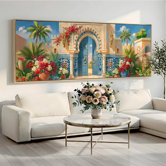 a large, colorful painting of an ornate gate and lush tropical foliage hanging on a wall above a white sofa and a round coffee table.