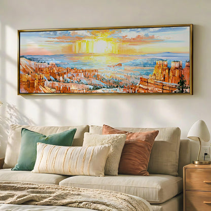 a large, colorful painting of a desert landscape hanging on a wall above a bed with pillows.