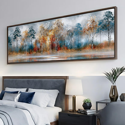 a large painting of a forest landscape hanging on a wall above a bed with white bedding and a gray headboard.