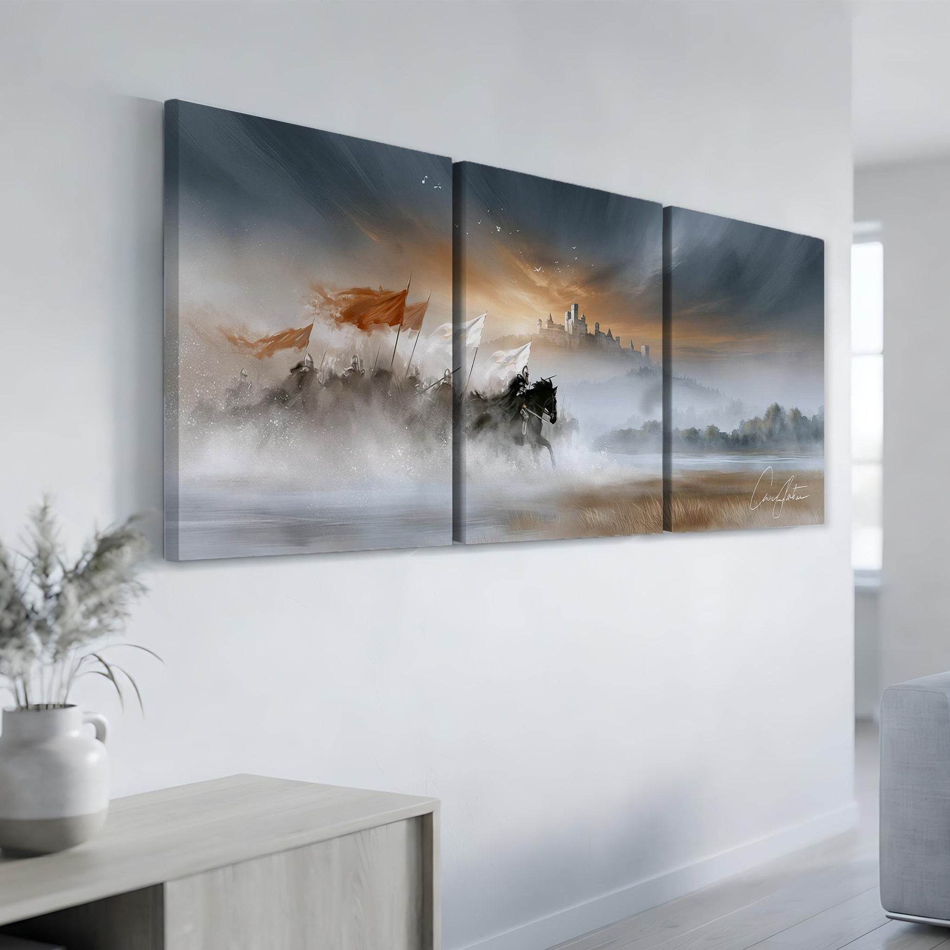 a triptych artwork displayed on a wall, depicting a serene landscape with a castle in the distance and a misty, atmospheric background.