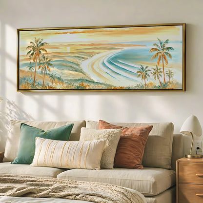 a large painting of a beach scene hanging on a wall above a beige sofa with colorful throw pillows.