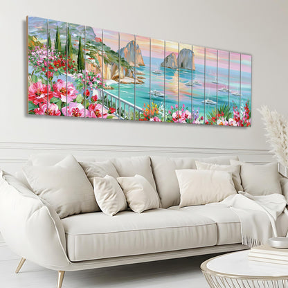a large, colorful painting of a coastal landscape with boats and flowers, hanging on a wall above a white sofa in a living room setting.
