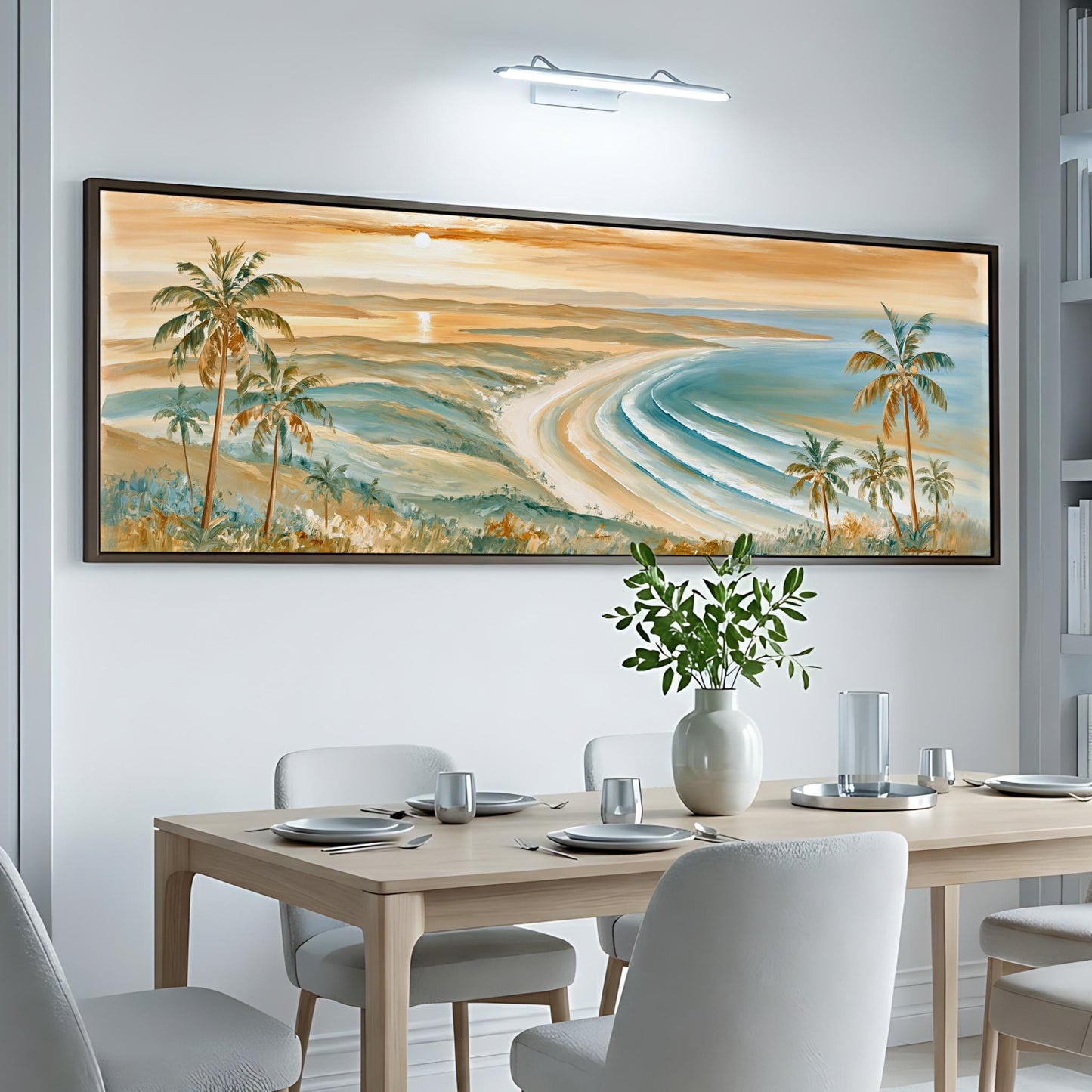 a large painting of a tropical beach scene hanging on a wall above a dining table with white chairs.