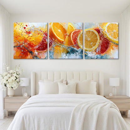 A large, colorful painting of oranges and water splashing across a white background is displayed on the wall above a bed with white bedding.