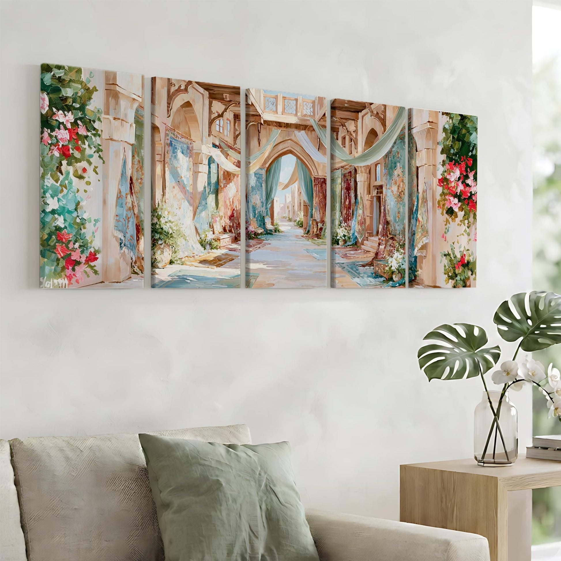 a large, colorful painting of a picturesque alleyway with arches, flowers, and greenery, hanging on a wall above a couch in a living room setting.