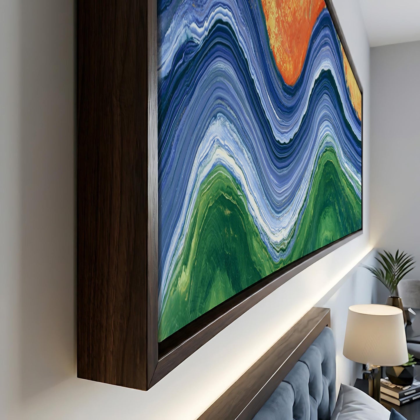 a large, colorful abstract painting hanging on a wall, with a wooden frame surrounding it.