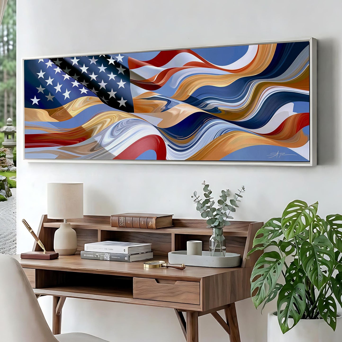 a large, colorful abstract painting of the American flag hanging on a wall above a wooden desk with various items on it.