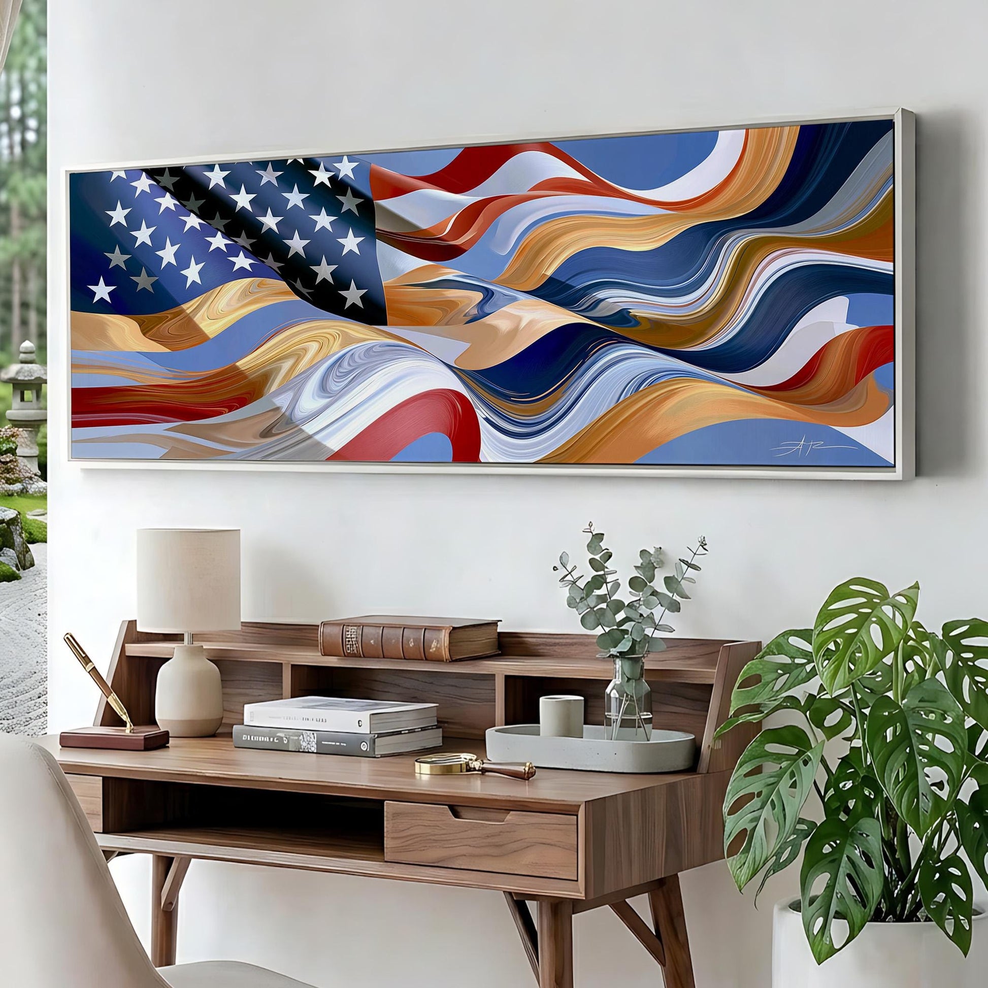 a large, colorful abstract painting of the American flag hanging on a wall above a wooden desk with various items on it.