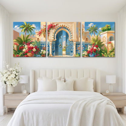 a bedroom with a large, colorful painting of an ornate, blue-arched gate above the bed. The painting is surrounded by white flowers and lush greenery, creating a vibrant and inviting atmosphere.