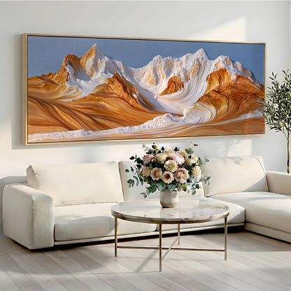 a large, vibrant painting of a mountain landscape hanging on a wall above a white sofa and a round coffee table with a vase of flowers.