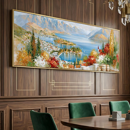 a large, colorful painting of a scenic landscape hanging on a wooden wall above a dining table with green chairs.