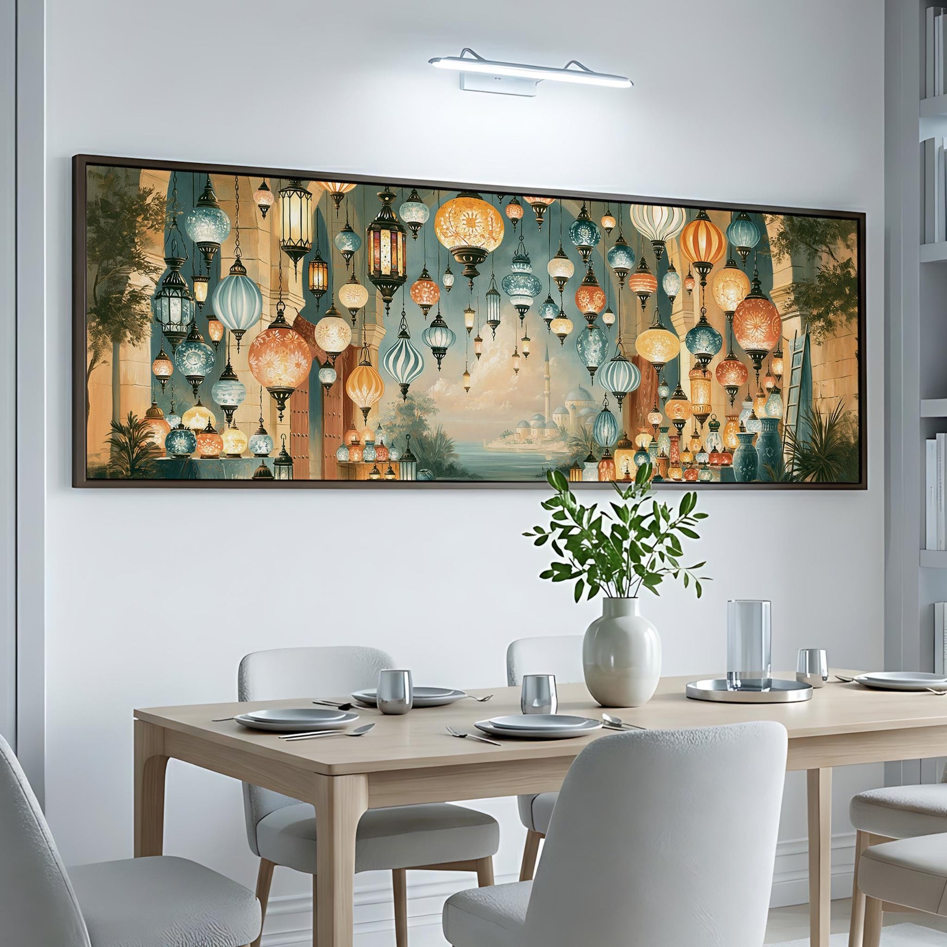 a dining room with a large, colorful painting of hanging lanterns on the wall above a table set for a meal.
