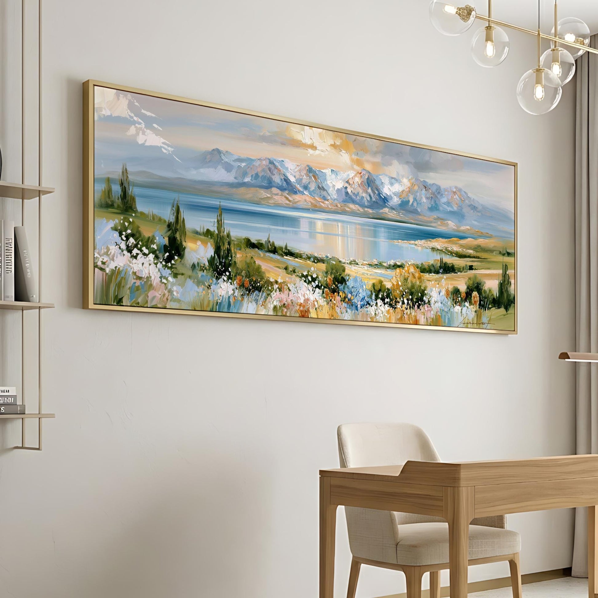 a large landscape painting hanging on a wall, depicting a serene mountain scene with a lake and colorful flowers.