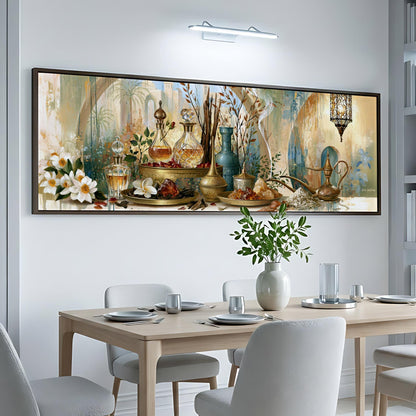 a large, colorful painting of various objects, including vases, bottles, and flowers, displayed on a wall above a dining table with chairs.