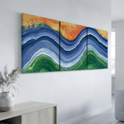 a large, colorful abstract painting hanging on a white wall.