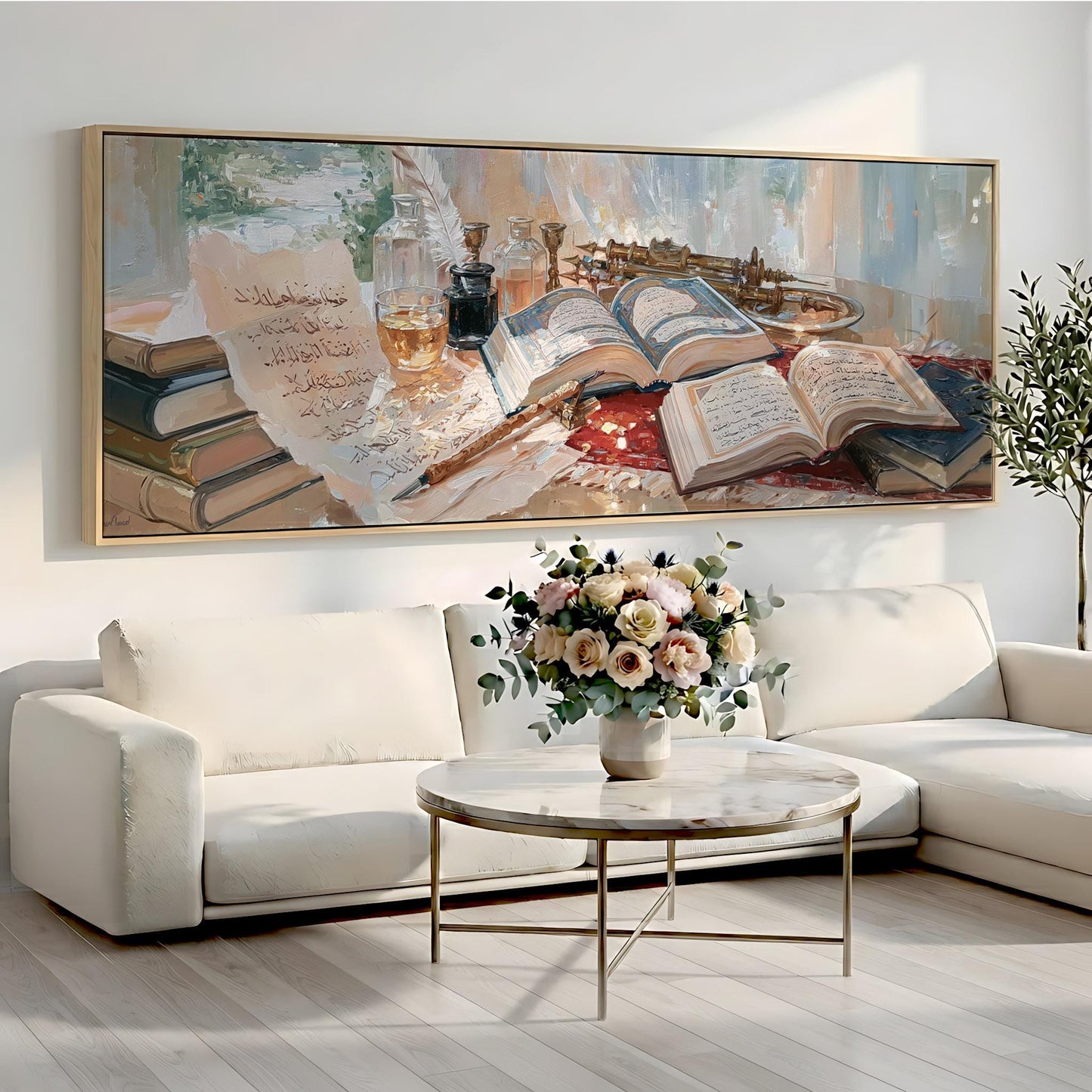 a large painting of a table with a vase of flowers, books, and other objects, hanging on a wall above a white sofa and a round coffee table.