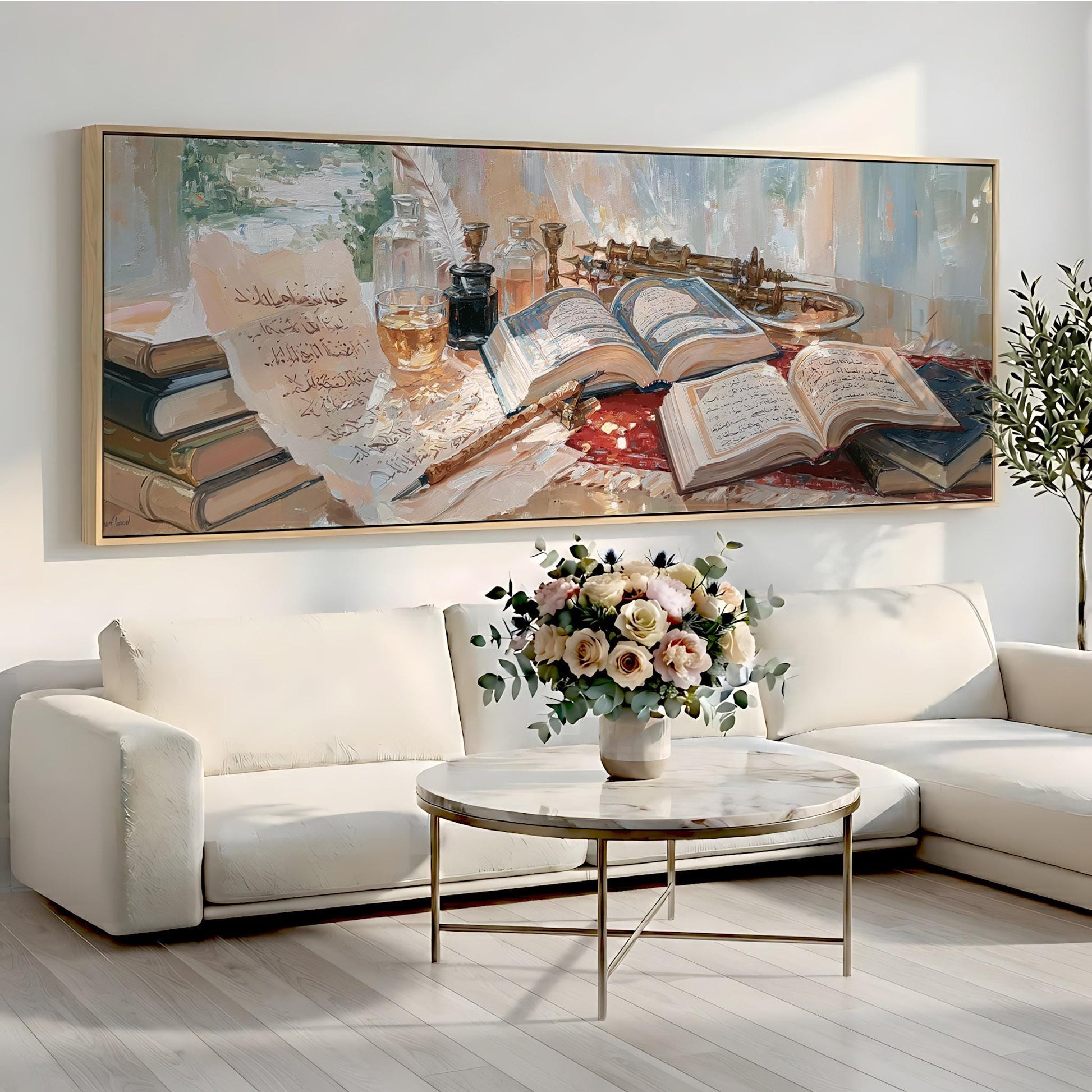 a large painting of a table with a vase of flowers, books, and other objects, hanging on a wall above a white sofa and a round coffee table.