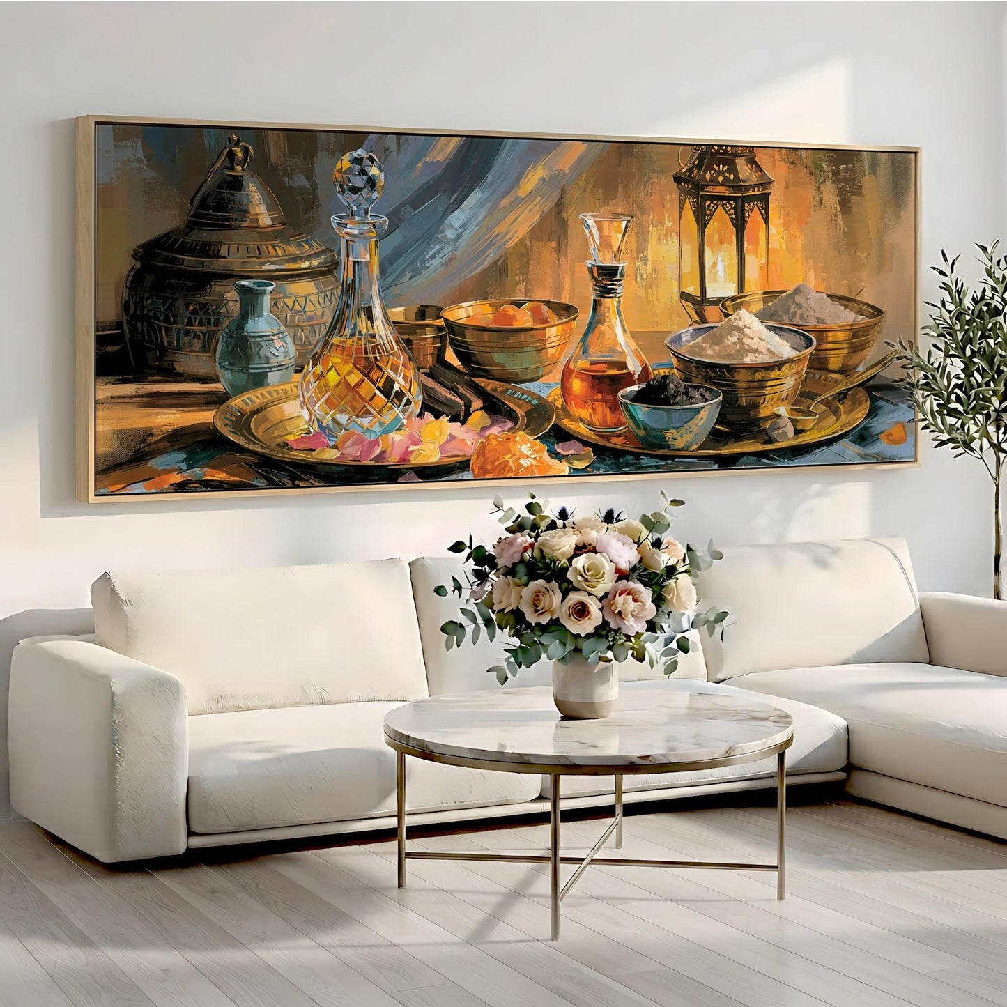 a large painting of various objects, including vases, bowls, and a floral arrangement, displayed on a wall above a white sofa and a round coffee table.