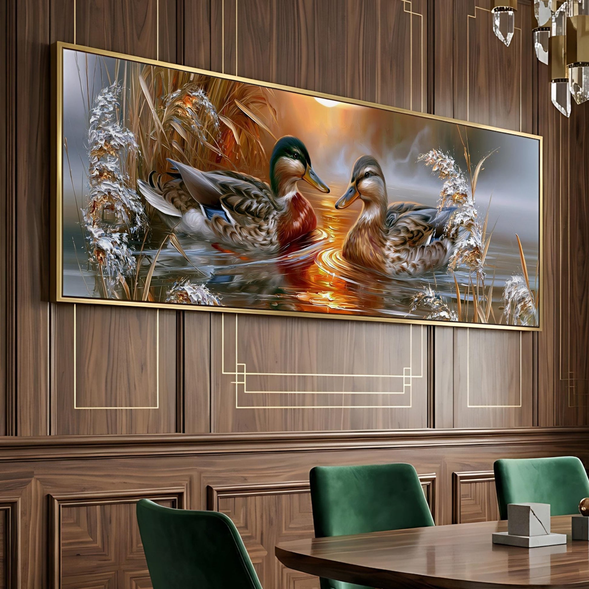 a large painting of two ducks swimming in a pond, with a warm, golden sunset in the background. The painting is displayed on a wooden wall above a dining table with green chairs.
