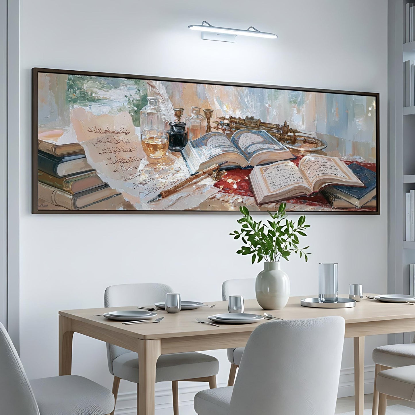 a large painting of a table with books and a vase of flowers, hanging on a white wall above a dining table with chairs.