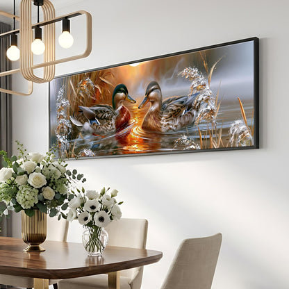 a large framed painting of ducks swimming in a pond, hanging on a wall above a dining table with a vase of flowers.
