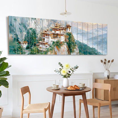 a dining area with a wooden table and chairs, a vase of flowers, and a large painting of a mountain village hanging on the wall above the table.