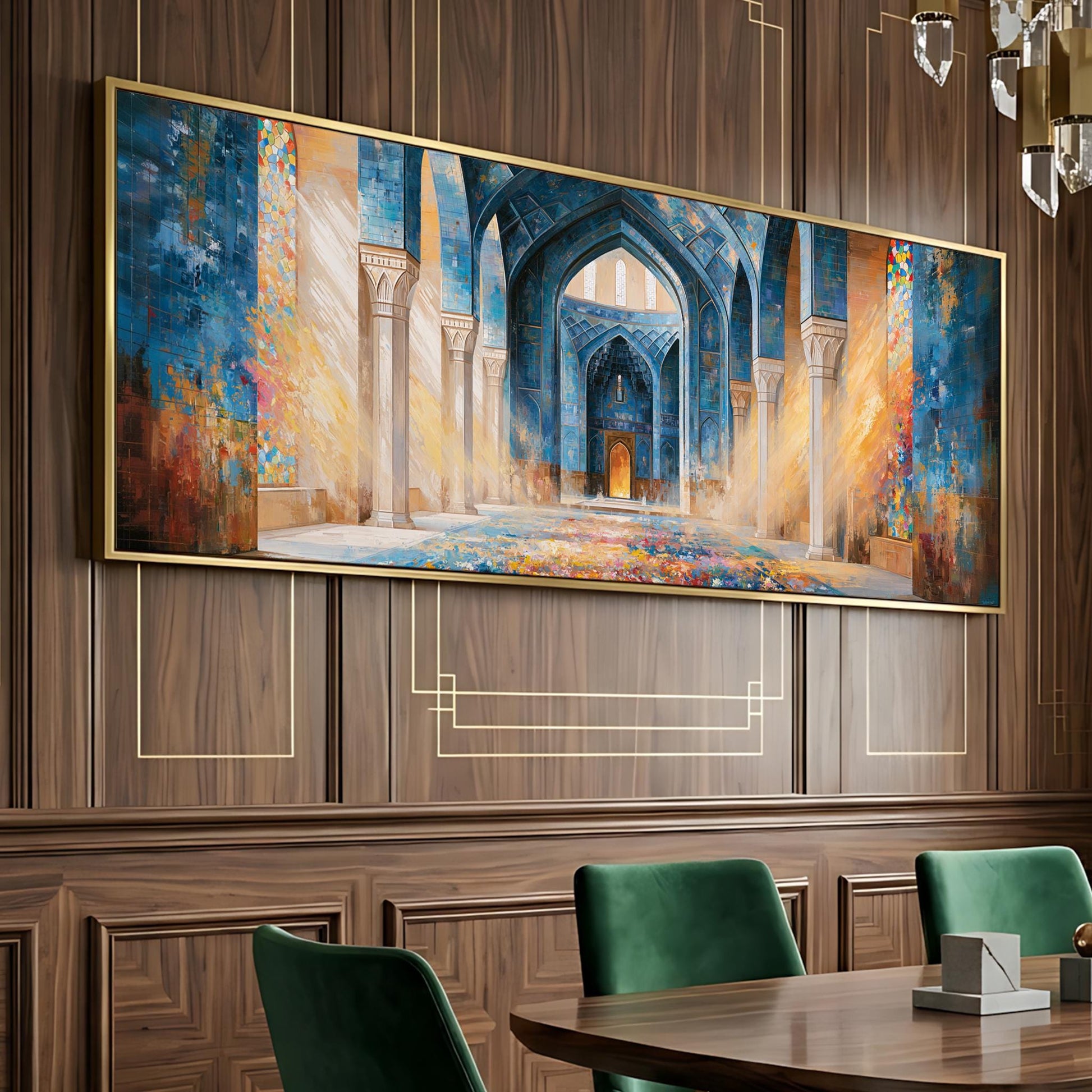 a large, ornate painting of an architectural structure, likely a mosque, hanging on a wooden wall. The painting is framed in gold and is the focal point of the room. In the foreground, there is a dining table with green chairs around it, suggesting a dining or meeting area.