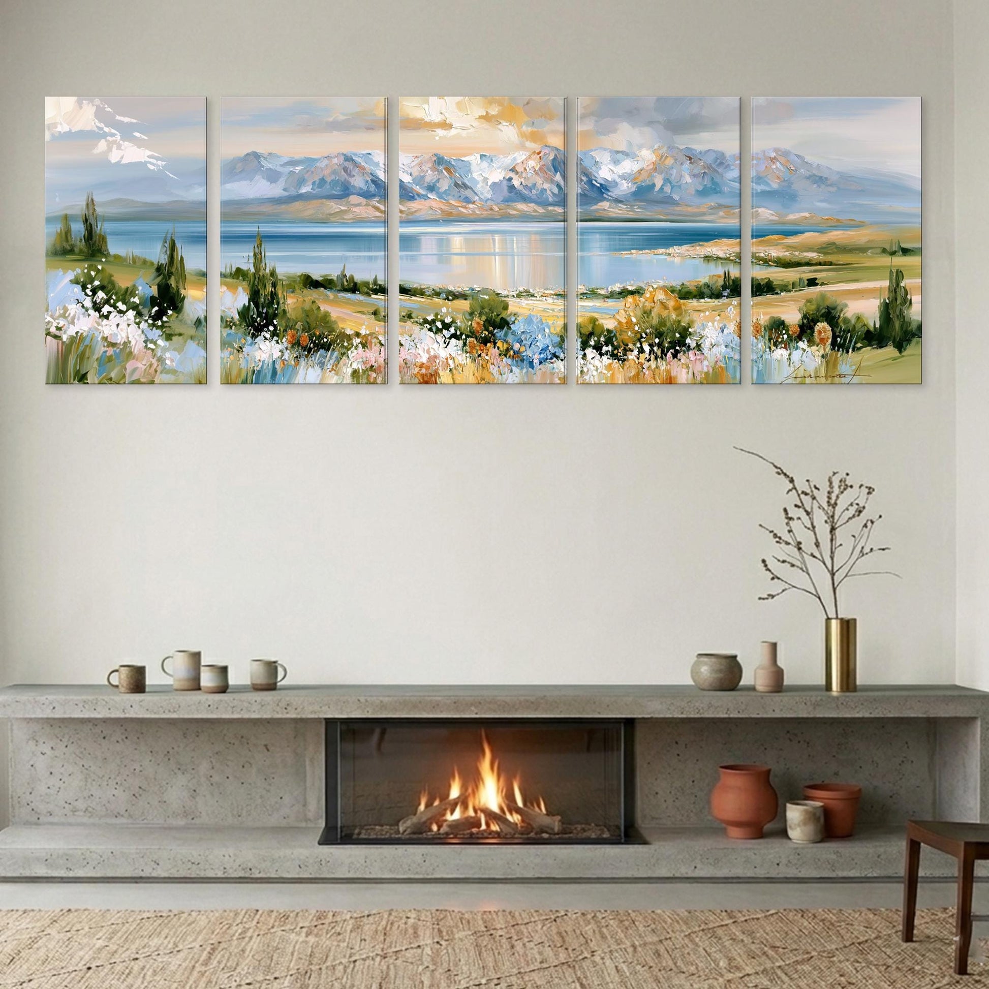 a cozy living room with a fireplace, a large landscape painting depicting a serene mountain scene, and various decorative elements such as vases and a potted plant.