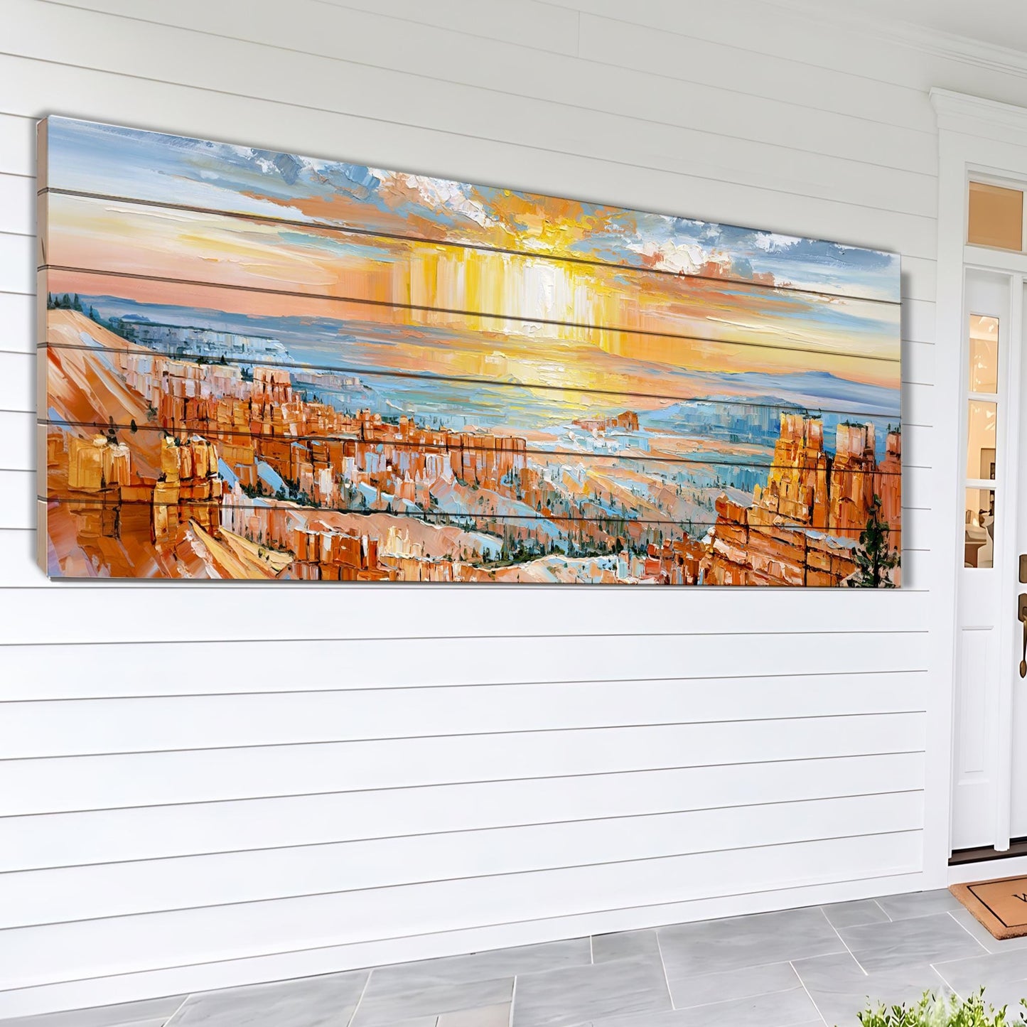 The image is a large painting depicting a scenic landscape with a sunset over a mountainous terrain.
