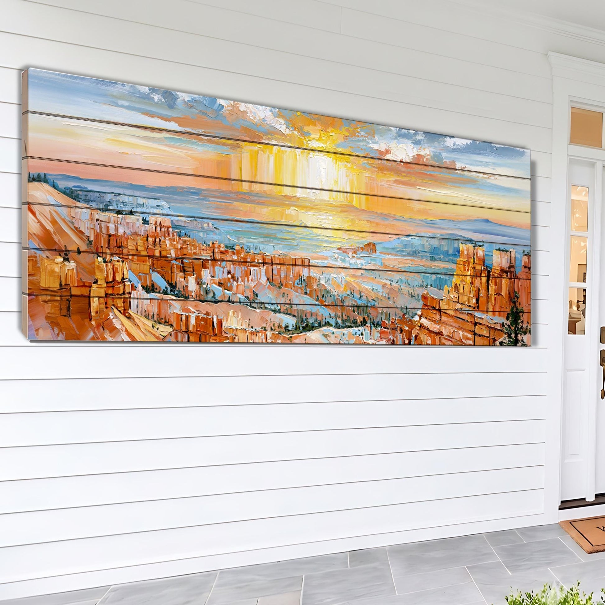 The image is a large painting depicting a scenic landscape with a sunset over a mountainous terrain.