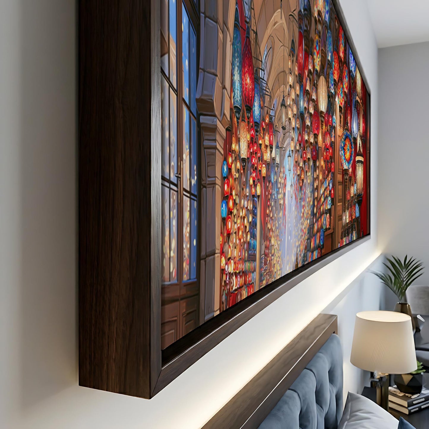 a large, colorful painting of a cityscape with numerous lights and buildings, displayed on a wall.