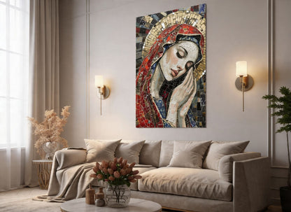a large mosaic artwork depicting a woman's face, hanging on a wall above a beige sofa in a living room setting.