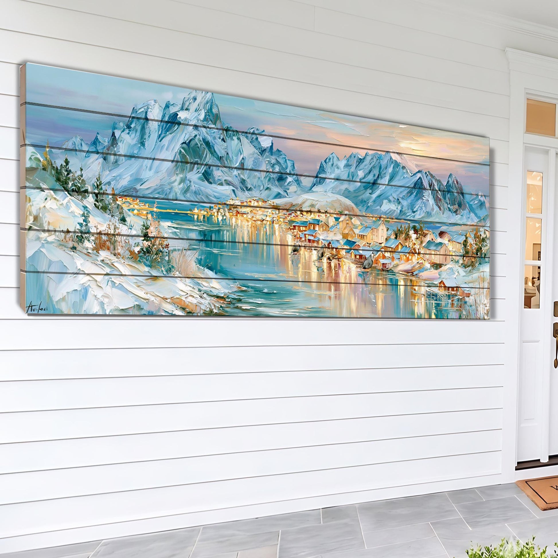 A large, colorful painting depicting a scenic mountain landscape with a town or village in the foreground, set against a backdrop of snow-capped peaks and a serene body of water.