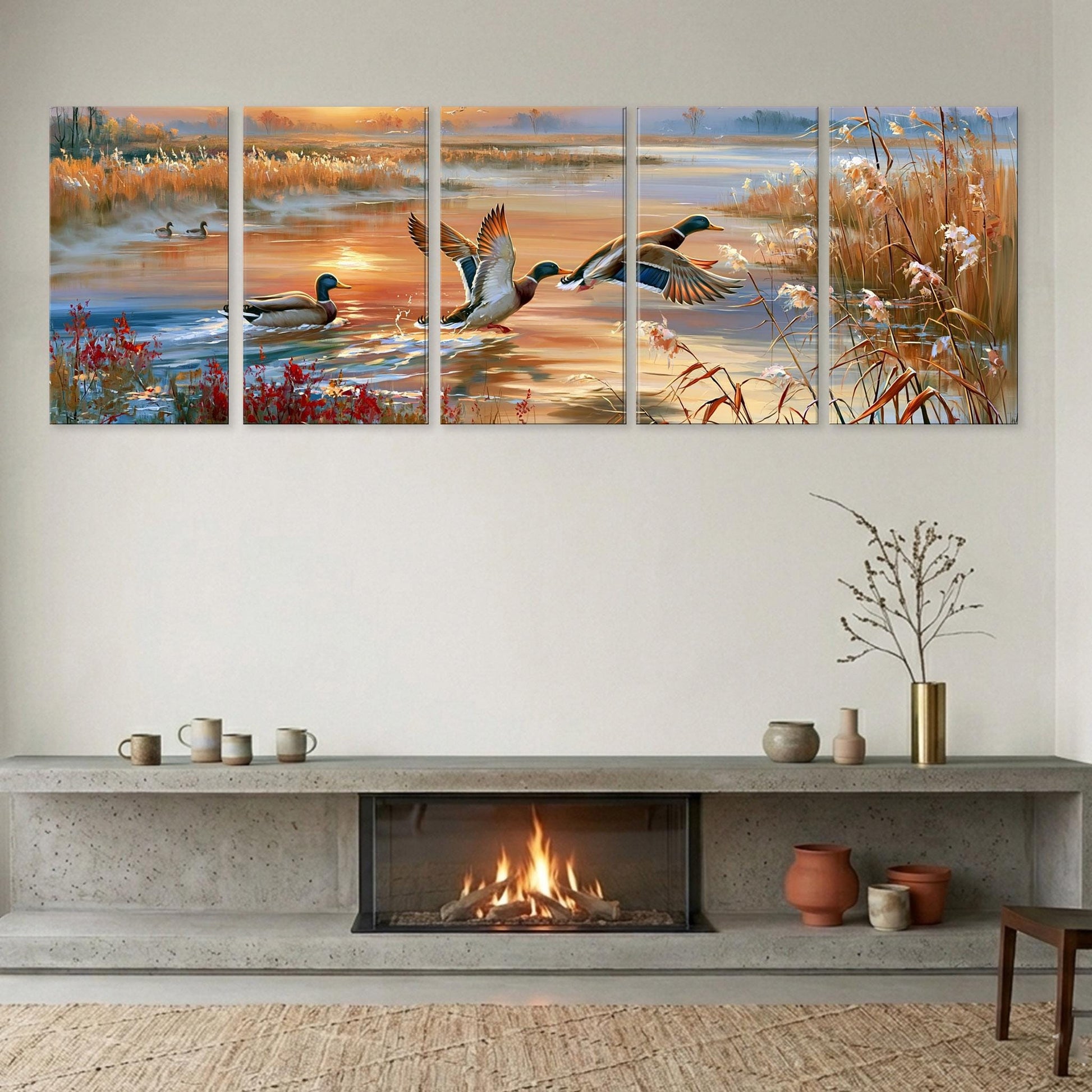 A cozy living room with a fireplace, a large wall art depicting ducks in a pond, and various decorative items on a shelf below the fireplace.