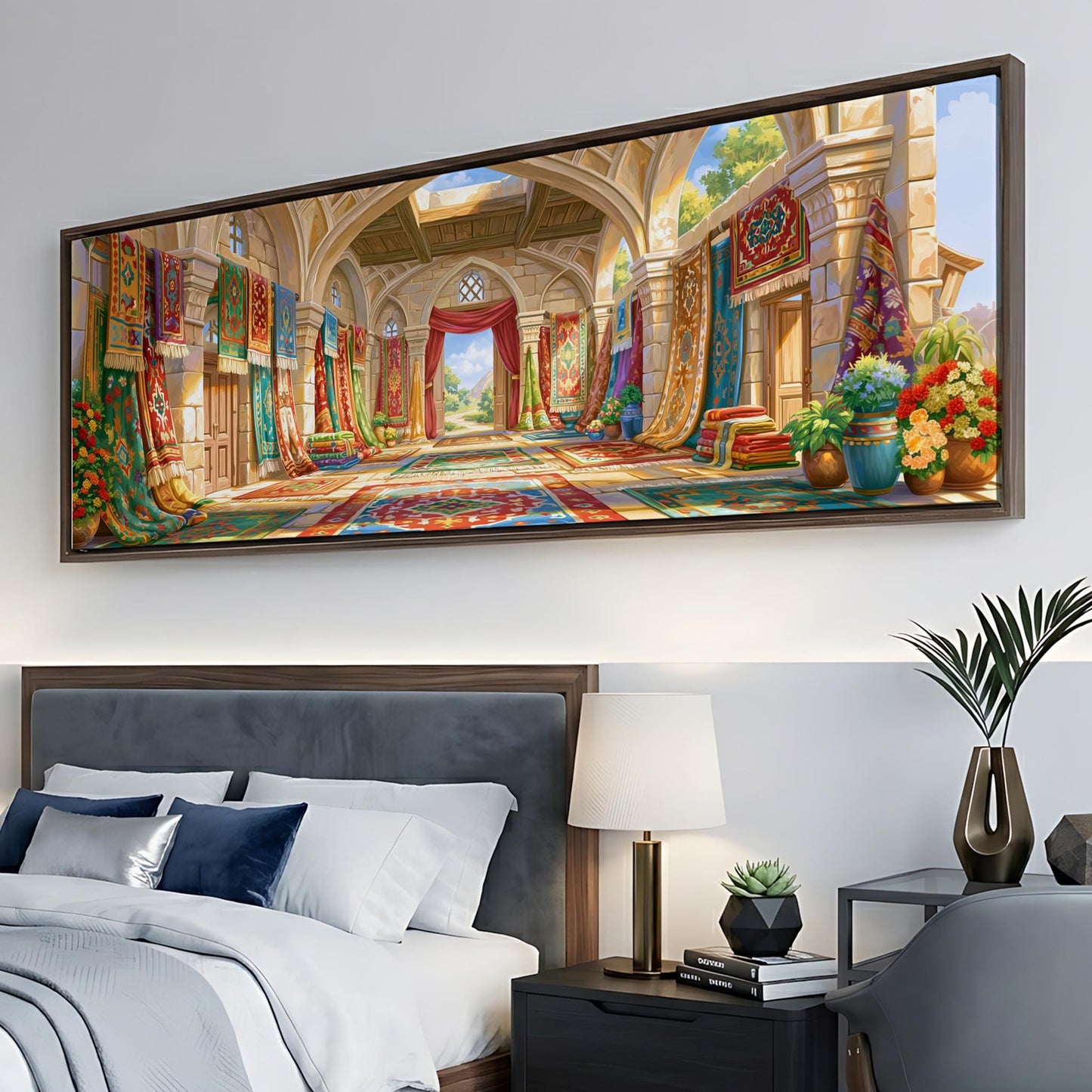 a large, colorful painting of an ornate, palace-like interior hanging on a wall above a bed with white linens and a nightstand with a lamp.