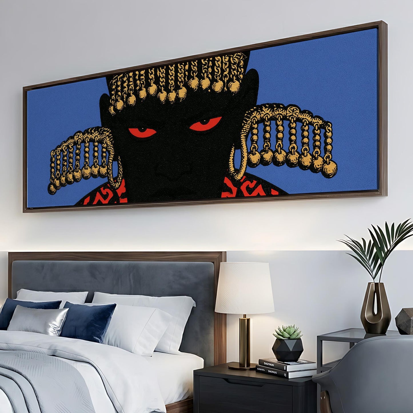 a large, colorful painting of a person's face with gold accessories hanging on the wall above a bed with white linens and a wooden headboard.