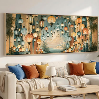 a large, colorful painting of hanging lanterns on a wall above a white couch with throw pillows.
