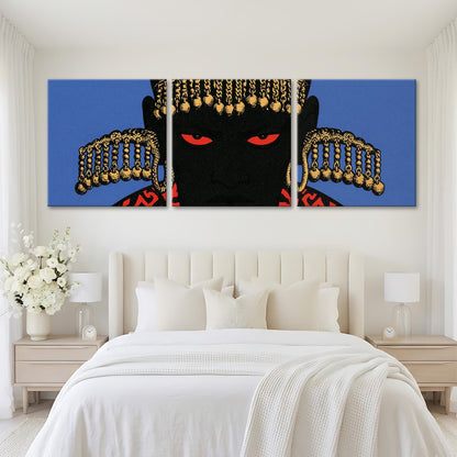 A large, three-panel artwork depicting a black figure with gold accents and red eyes is displayed on the wall above a white bed in a bedroom setting.