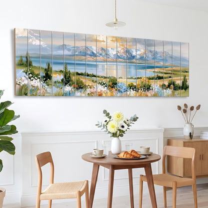 a large, colorful painting of a landscape with mountains, flowers, and a lake, hanging on a wall above a wooden dining table with two chairs.