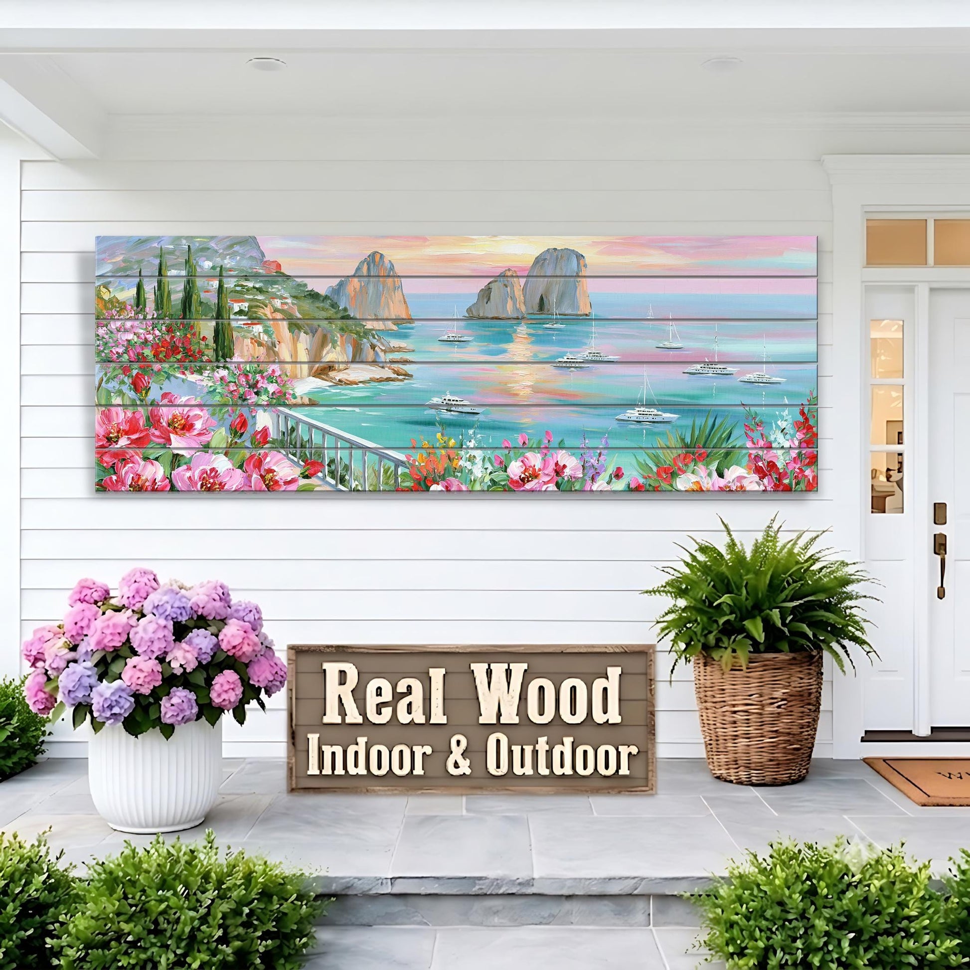 a large painting of a coastal landscape with boats on the water, displayed on a white wall above a wooden sign that reads "Real Wood Indoor & Outdoor". The painting is surrounded by potted plants and flowers, creating a welcoming and natural atmosphere.