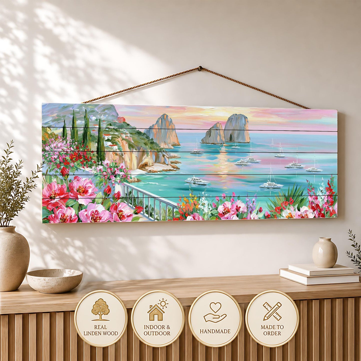 a wooden wall hanging with a vibrant painting depicting a picturesque coastal scene with boats, flowers, and a sunset over the water.