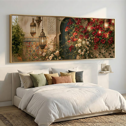 a large, ornate painting of a garden scene with red flowers and a green archway, hanging above a bed with white linens and pillows.