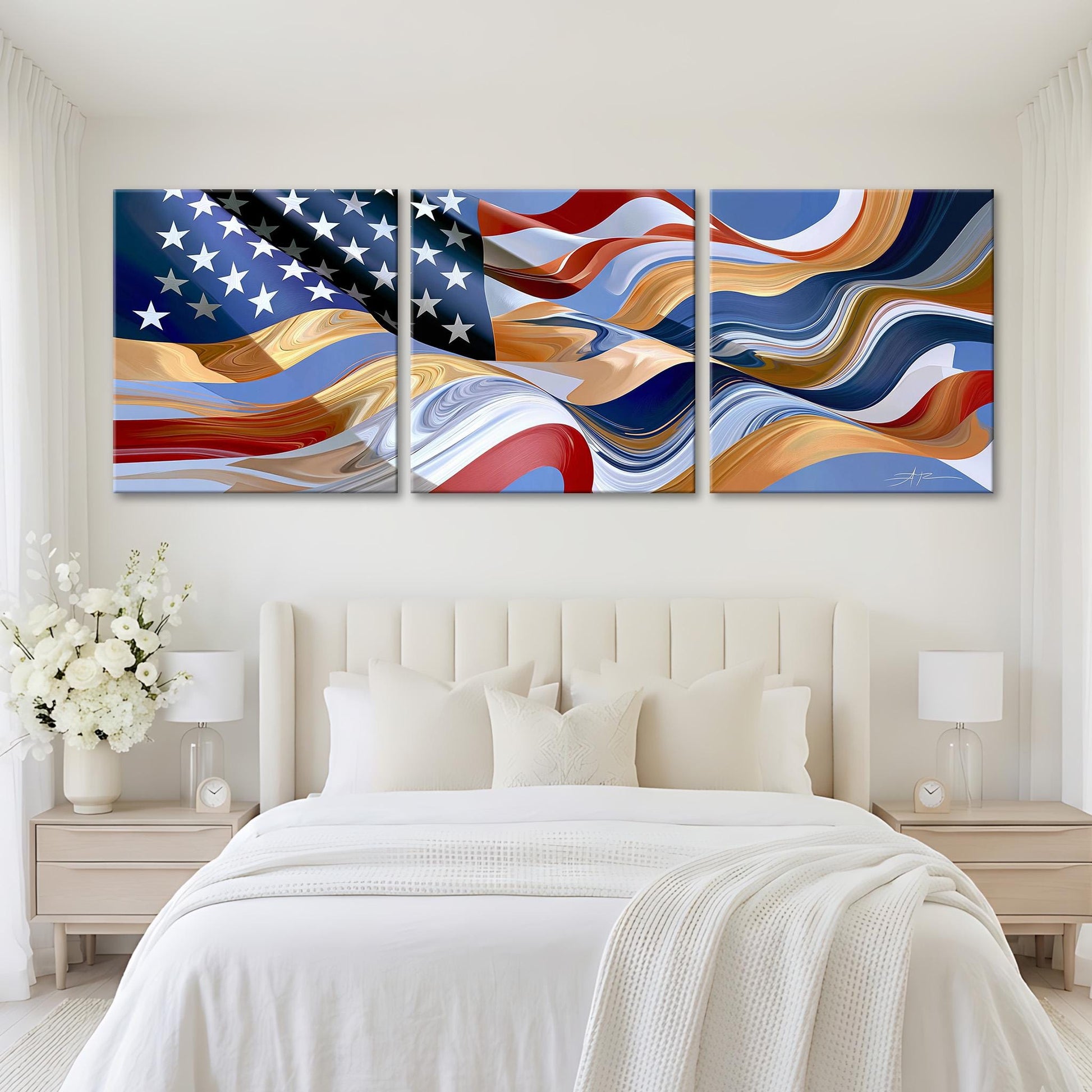 a large, colorful, abstract painting of the American flag displayed on the wall above a bed with white bedding.