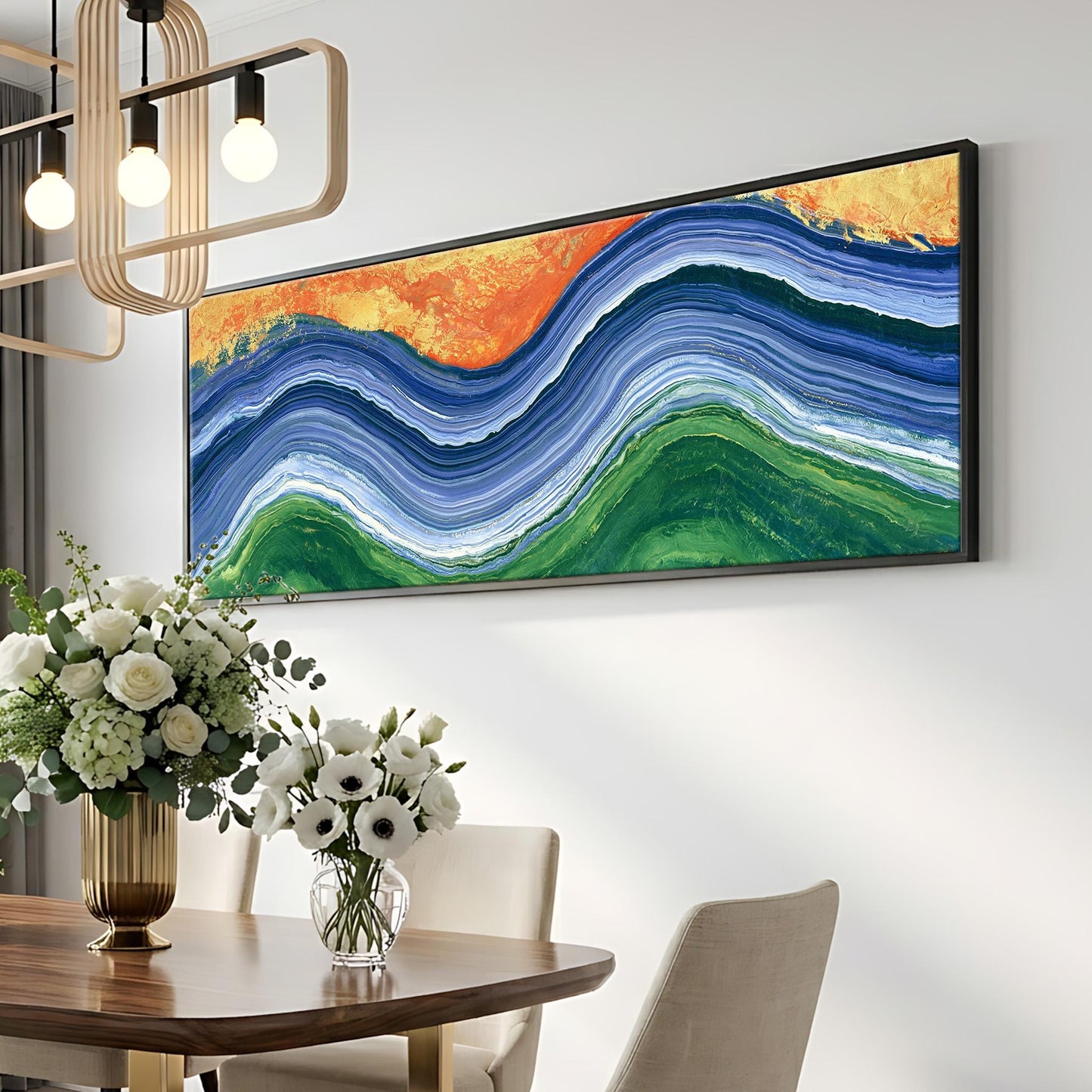 a dining room with a wooden table, a vase of white flowers, and a large abstract painting hanging on the wall above the table.