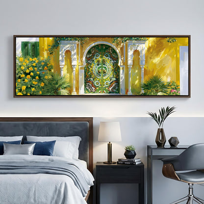 a large, colorful painting of an ornate, green and yellow gate or archway, hanging on a wall above a bed with a gray headboard.