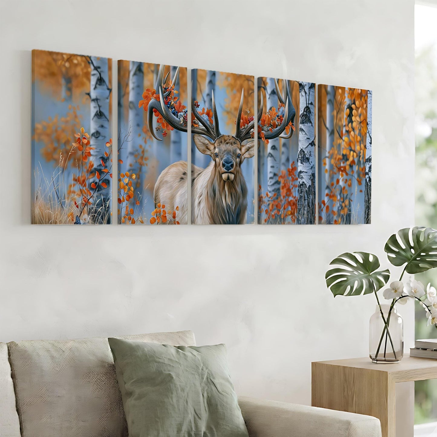 a large, colorful painting of a deer with antlers, displayed on a wall above a couch in a living room setting.