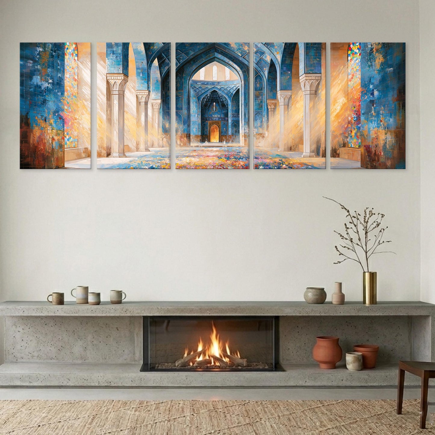 a modern living room with a fireplace, a large painting of an ornate, colorful archway above it, and various decorative elements such as vases and a potted plant.